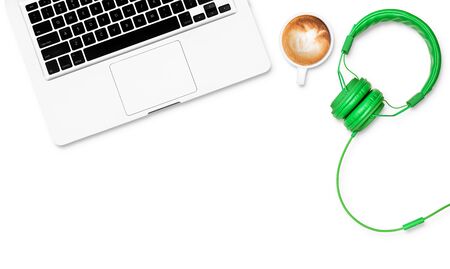 Top view white work space with computer coffee headphonesの写真素材