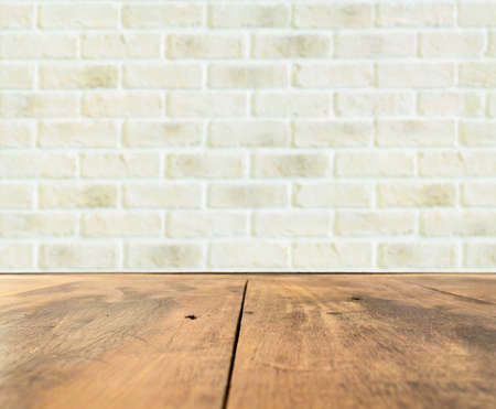 Grunge white brick cement wall and yellow wooden floor