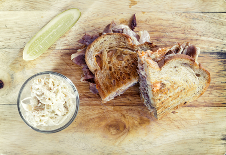 Reuben sandwich top view on wooden tableの写真素材