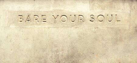 Bare your soul quotes engrave on grunge cement wall