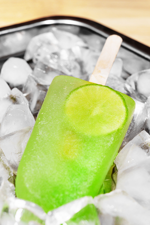 Lime sorbet ice cream on icecube backgroundの写真素材