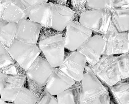 Ice cube on stainless backrgound