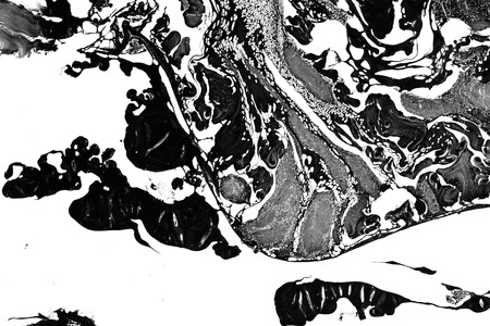 abstract black ink oil flow float on water look like marble webの写真素材