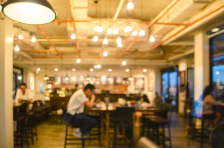 People sit in a blur banquets.の写真素材