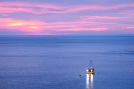 lonely boat on seaの写真素材