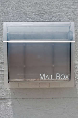 White mail box on wallの写真素材