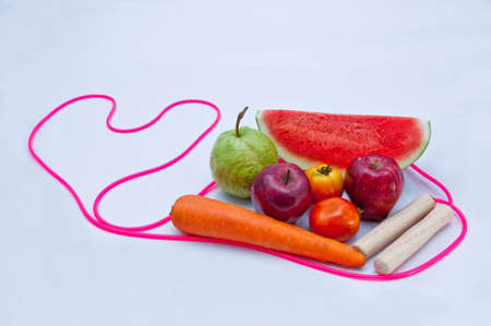 Jump Rope with fruit on white background.