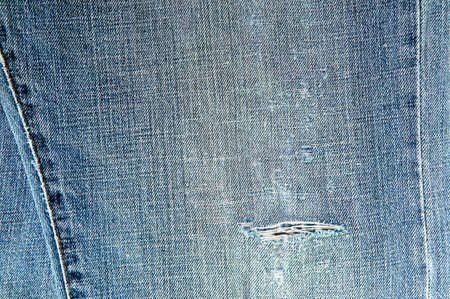 Close-up of the old blue jeans cloth.の写真素材