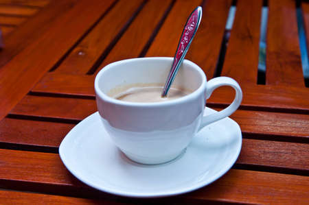 Fresh coffee with milk in cup.の写真素材