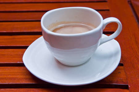 Fresh coffee with milk in cup.の写真素材
