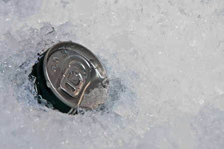 Beverage cans in the ice.