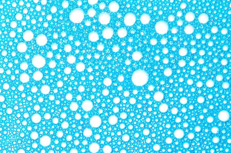 Picture a foam bubble blue macro background.の写真素材
