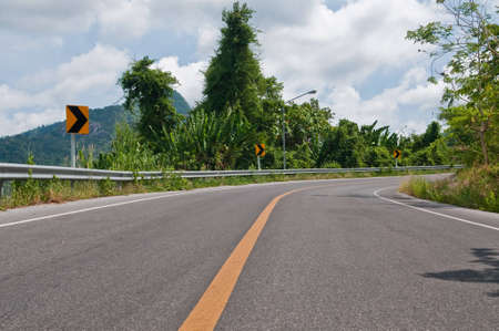 Empty road through the forest.の写真素材