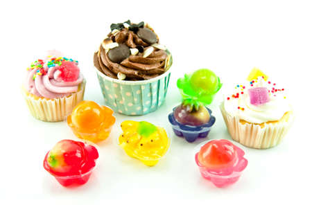 Colorful Cup Cake and jelly isolated on white backgroundの写真素材