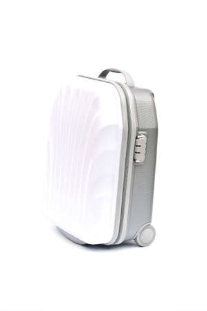 white plastic suitcase on wheels isolated on whiteの写真素材