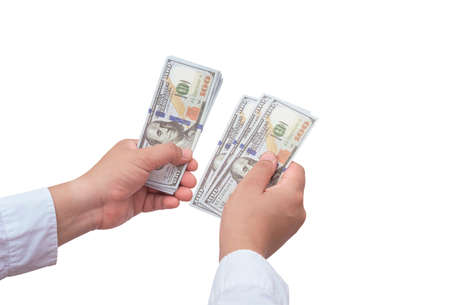 Man hand in white shirt counting dollar banknotes on isolated white background