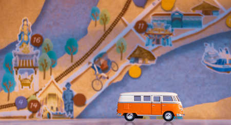 Samutsakhon, Thailand - February 07,2021: Mini Volkswagen van model on white floor with blurred...