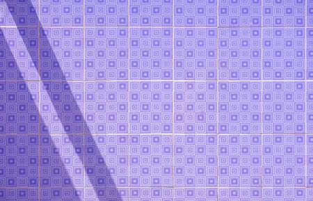 Sunlight and shadow on surface of purple tile wall background inside of homeの写真素材