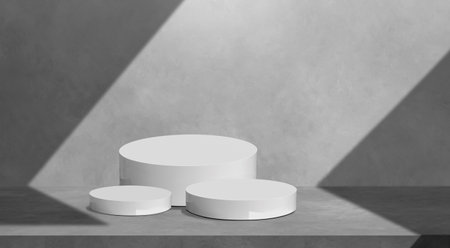 Products Display Presentation Background. White Podiums set on concrete wall with light and shadow on surface, Stage showcase Mockup in monochrome styleの写真素材