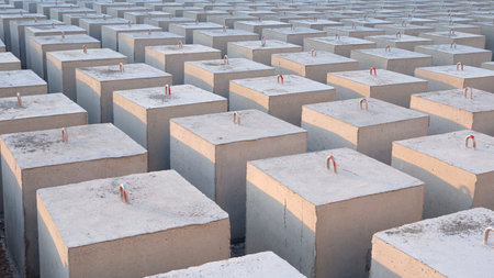 Background of many Concrete Anchors for posting Undersea Mooring Buoys on industrial yardの写真素材