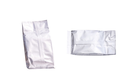 Two aluminium packaging foil bags isolated on white background with clipping pathの写真素材