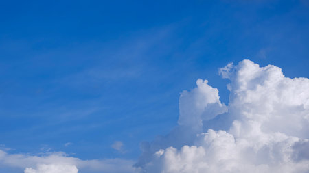 Summer blue Sky Background with white cumulus Cloud in wide screen viewの写真素材