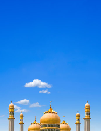 Golden Mosque Domes and Towers against blue sky in vertical frame, symbolic background of islamic religion with copy space for text Ramadan Kareem, Eid al adha, Eid al fitr, Mubaraの写真素材
