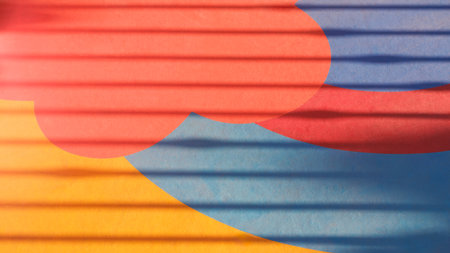 Light and shadow on colorful pattern surface of playground floor background in kindergarten school, high angle view with copy spaceの写真素材