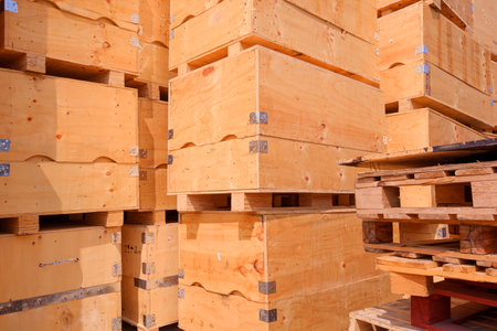 Stack of many the old big wood box containers with wooden pallets for sale and reusable with recycling conceptの写真素材