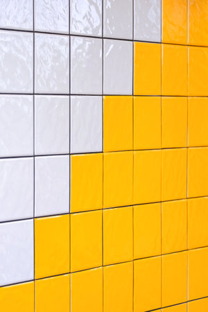 White and yellow ceramic interior tile wall decoration background in living room, perspective side view and vertical frameの写真素材