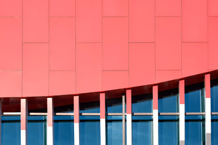 Red aluminium composite tiles decoration on glass wall of modern building, Geometric exterior...