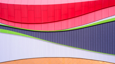 Modern geometric exterior building wall decoration background with colorful corrugated steel and aluminium composite tile abstract curve pattern in minimal designの写真素材