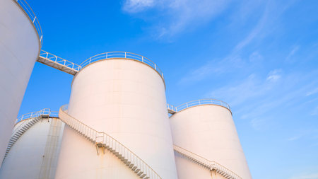 Crude Oil Industry, Storage Fuel Gas Tanks in Petroleum Refinery Industrial Factory area against...