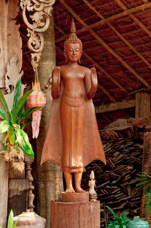 Buddha is a beautiful wood carving from Thailand の写真素材