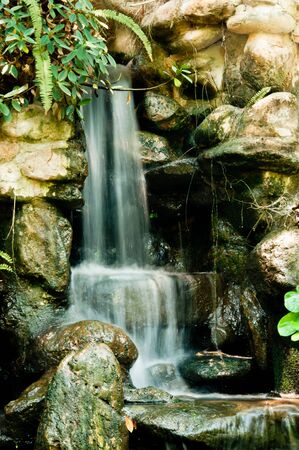 Small  waterfall in garden の写真素材