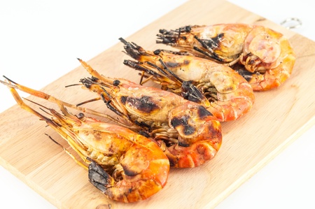 grilled prawns on wood white isolateの写真素材