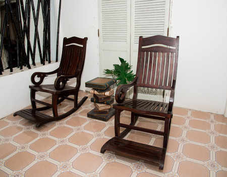 Rocking chair Made of wood In the area of the houseの写真素材