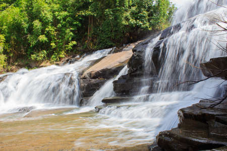 Deep forest waterfall at Thaisantisuk waterfall National Park KhaoKho Thailandの写真素材