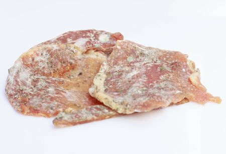 Close up Moldy spores on Dried pork on white back groundの写真素材