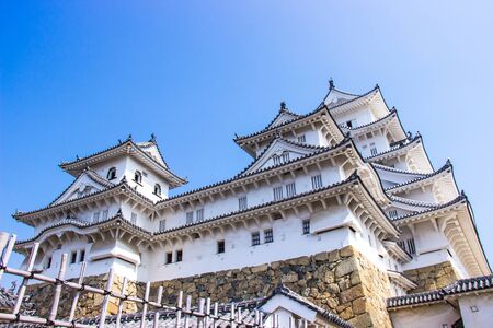 HIMEJI, JAPAN - MARCH 11, 2018: Himeji castle during sakura blossom time are going to bloom in Hyogo prefecture, Japanのeditorial素材