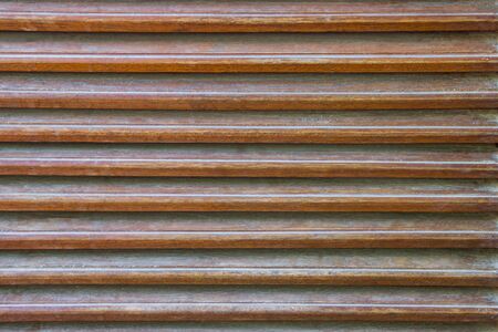 Close up, Parallel wooden slats texture. as an element of decor interior and ventilation.の写真素材