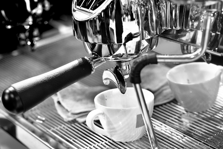 espresso shot from coffee machine in coffee shop,Coffee maker in coffee shopの写真素材
