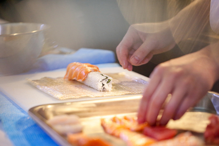 chef hands preparing japanese food, chef making sushi, Preparing Sushi rollの写真素材