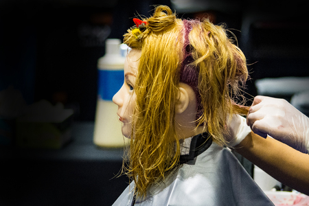 Hairstyles on dummy head of hair salonの写真素材