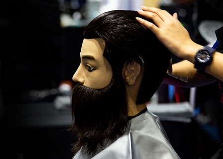 Hairstyles on dummy head of hair salonの写真素材