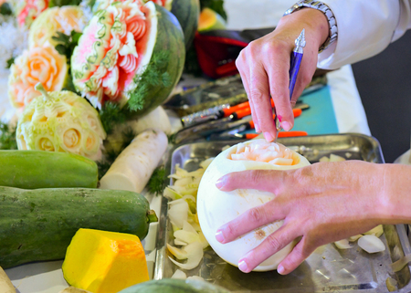 Thai fruit carving with hand, Vegetable and Fruit Carvingの写真素材
