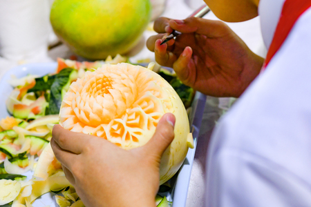 Thai fruit carving with hand, Vegetable and Fruit Carvingの写真素材