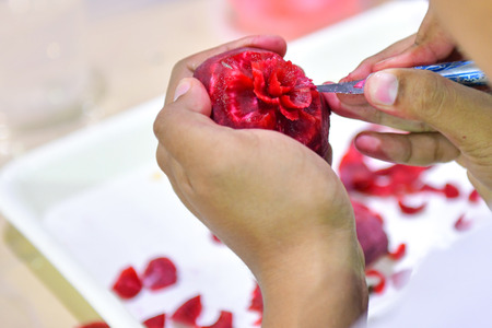 Thai fruit carving with hand, Vegetable and Fruit Carvingの写真素材