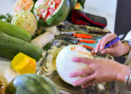 Thai fruit carving with hand, Vegetable and Fruit Carvingの写真素材