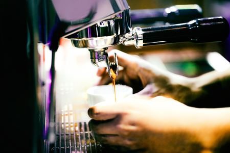 espresso shot from coffee machine in coffee shop, Coffee maker in coffee shopの写真素材